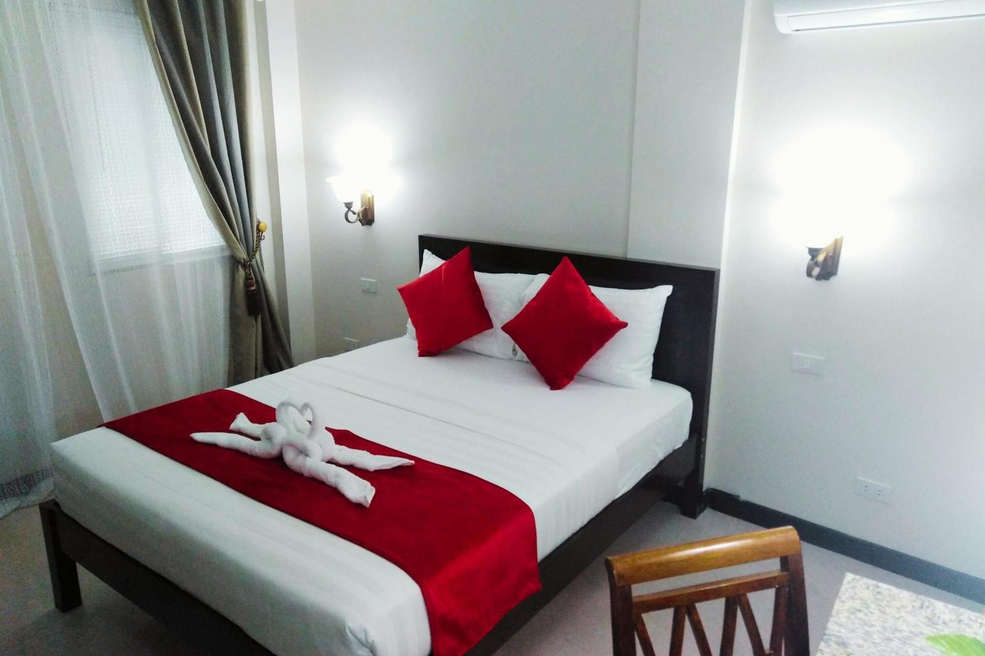 Venezia Suites Hotel Iloilo Værelse billede
