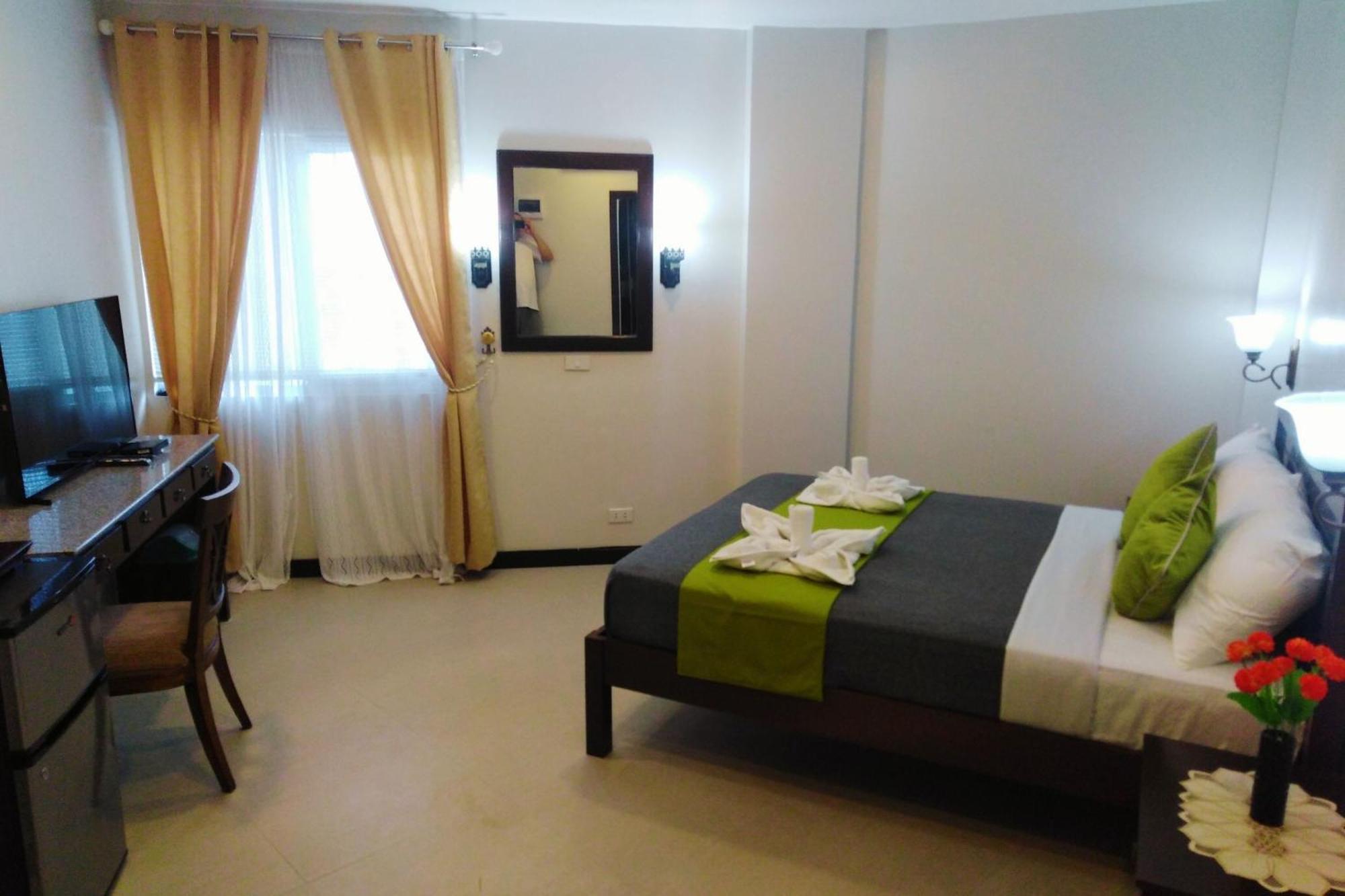 Venezia Suites Hotel Iloilo Værelse billede