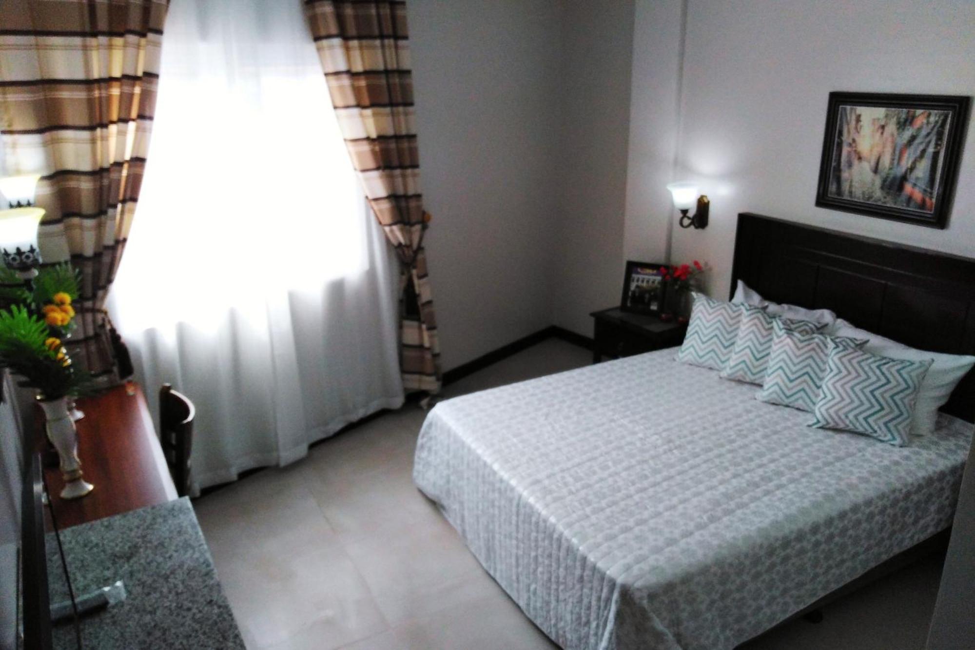 Venezia Suites Hotel Iloilo Værelse billede
